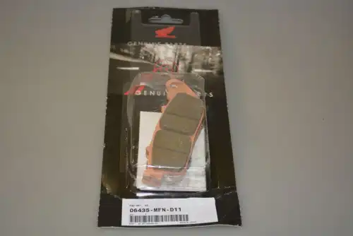 Тормозные колодки дисковые HONDA 06435MFND11
