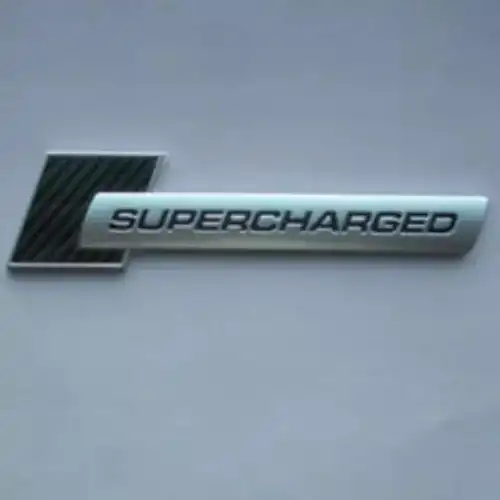  (AUDI), ЭМБЛЕМА AUDI 'SUPERCHARGED' 4F0853601A2ZZ VAG